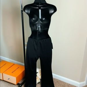 NWT black halter top jumpsuit wide leg.